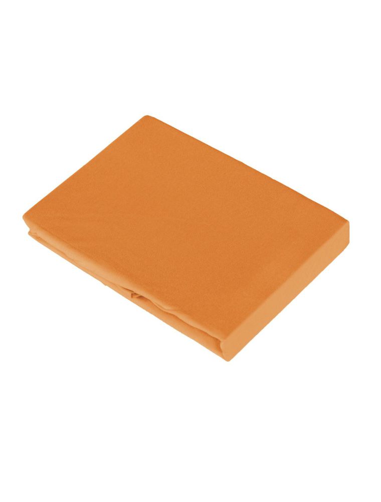 Spannbetttuch in sunset-orange, gefaltet. Aus zertifizierter Bio-Baumwolle mit mikrofeinem Rosenquarz.